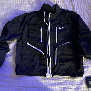Nike women’s Black Windbreaker with White Accents